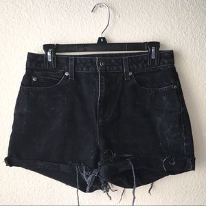 Black high-waisted cutoff shorts